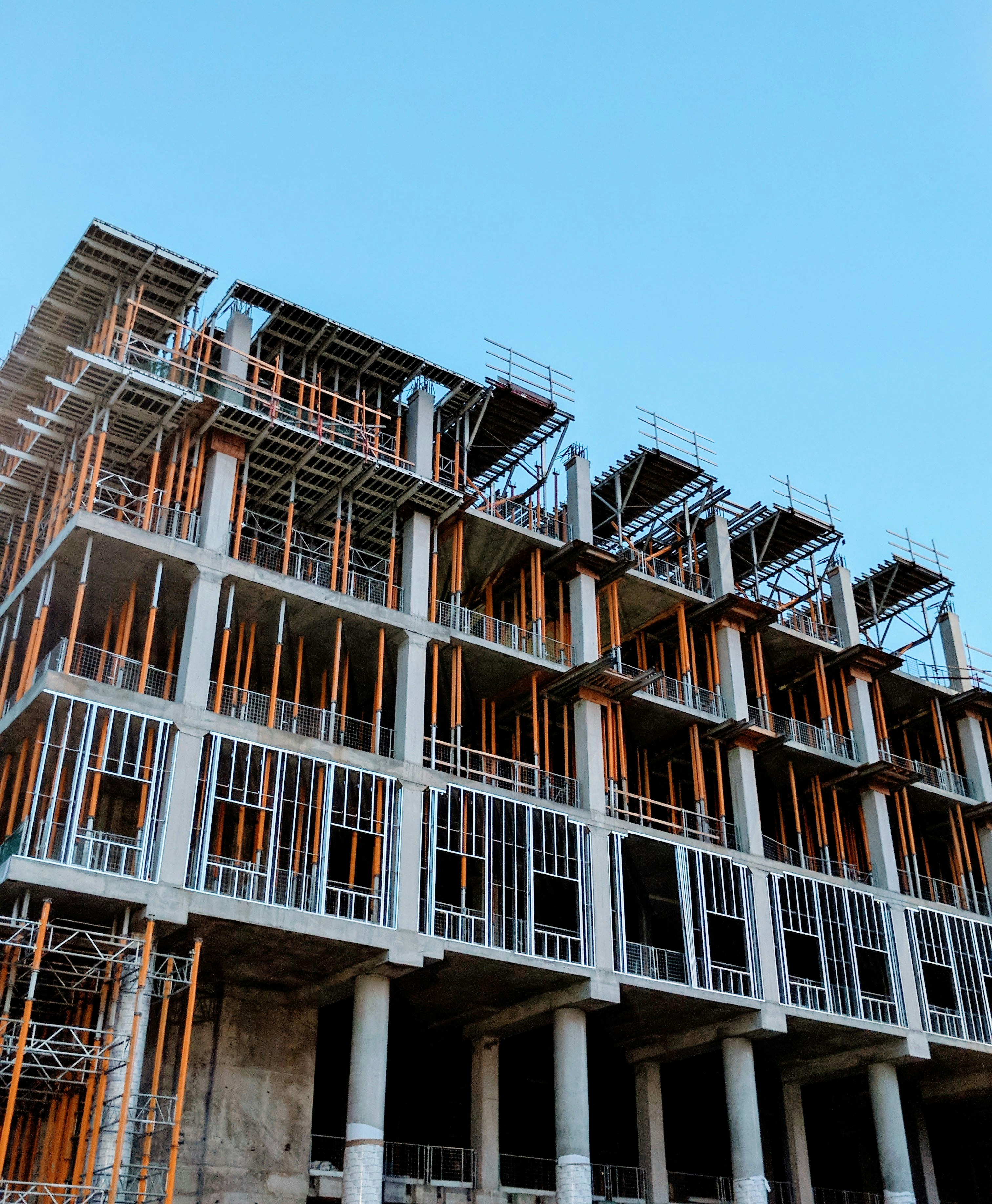 Commercial concrete structure under construction with exposed formwork