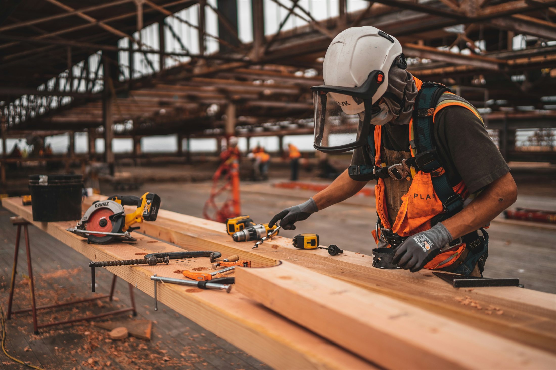 Commercial tradesperson working with tools on site