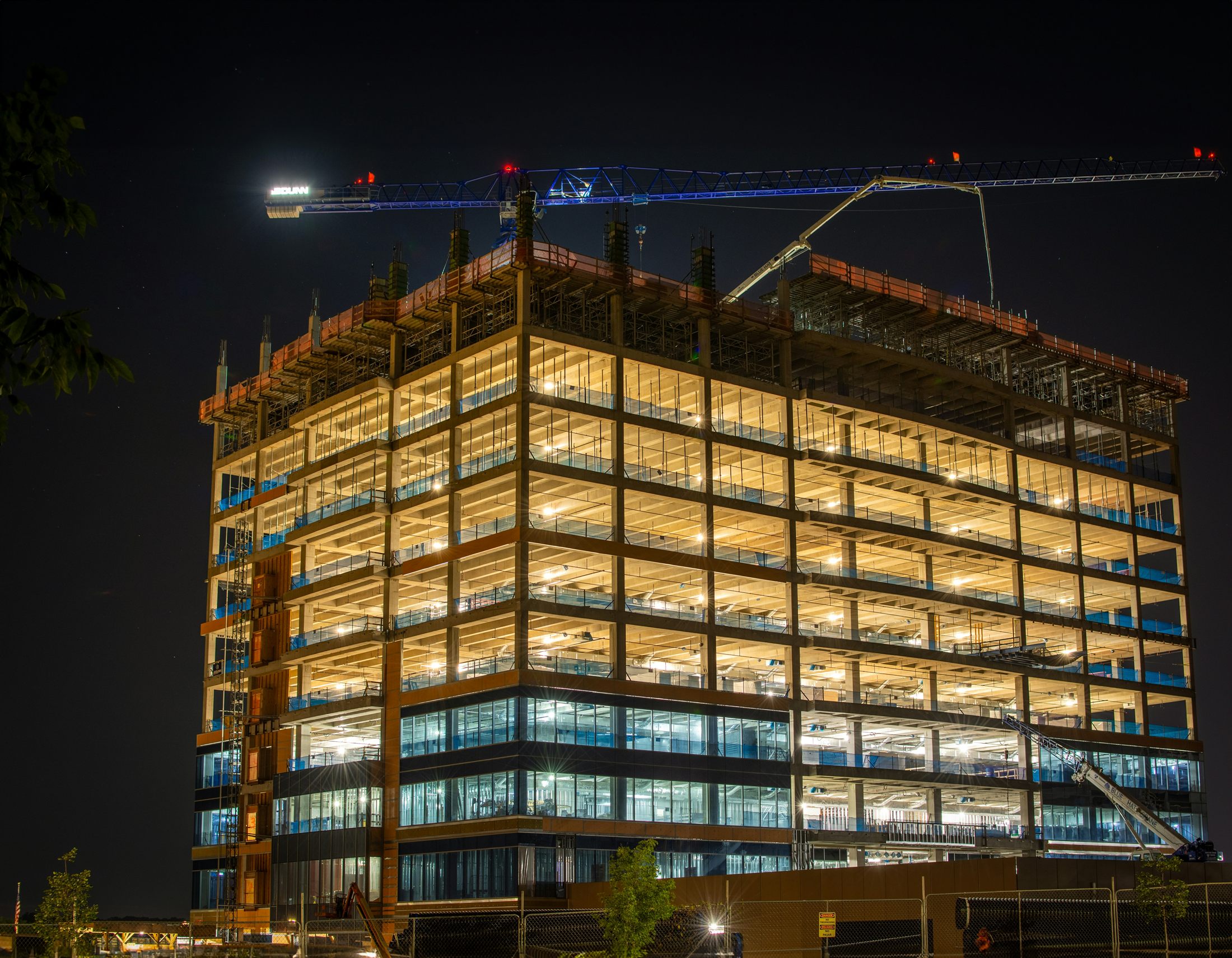 Commercial building construction site operating at night