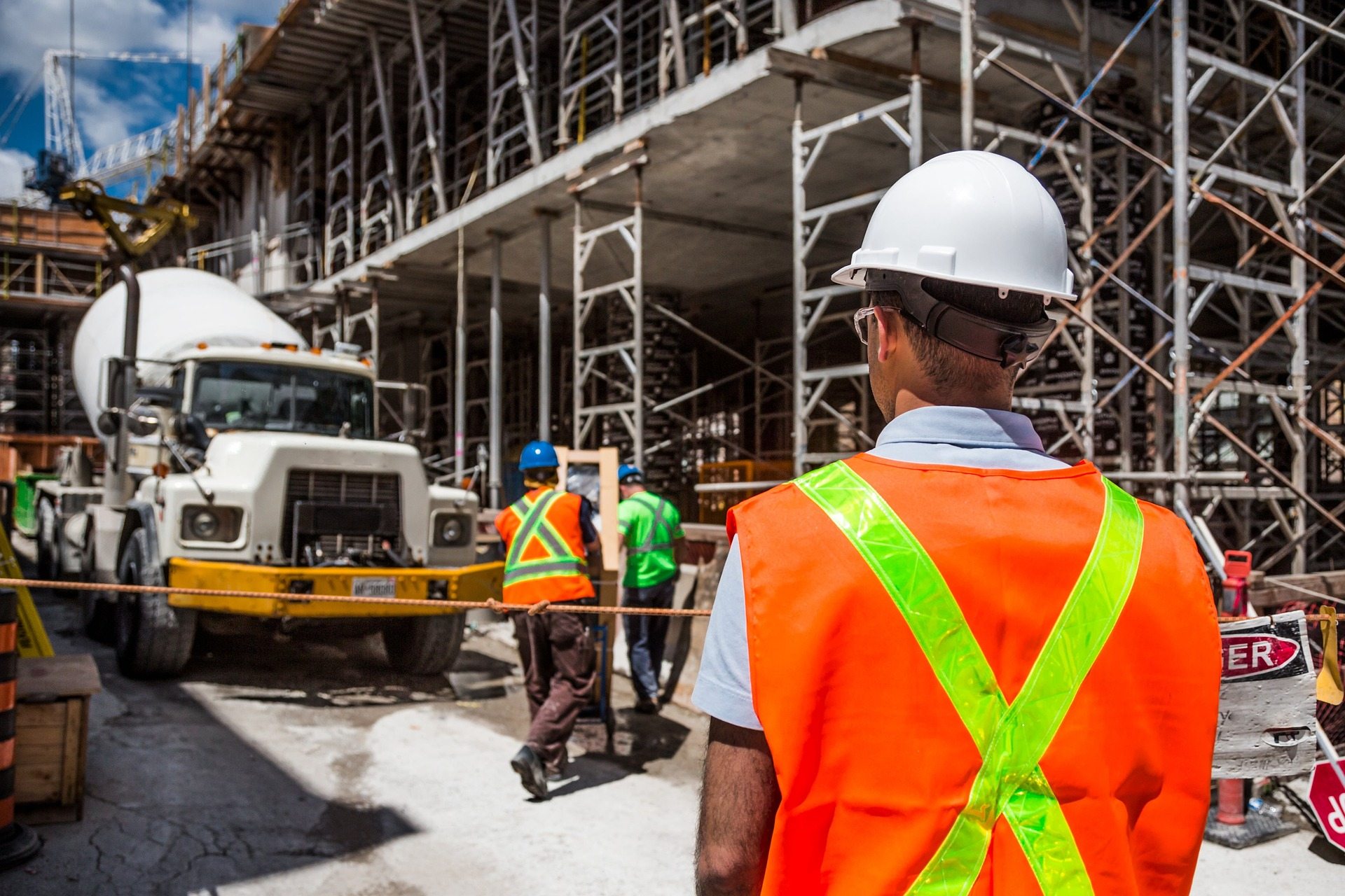 Site supervisor watching commercial construction work